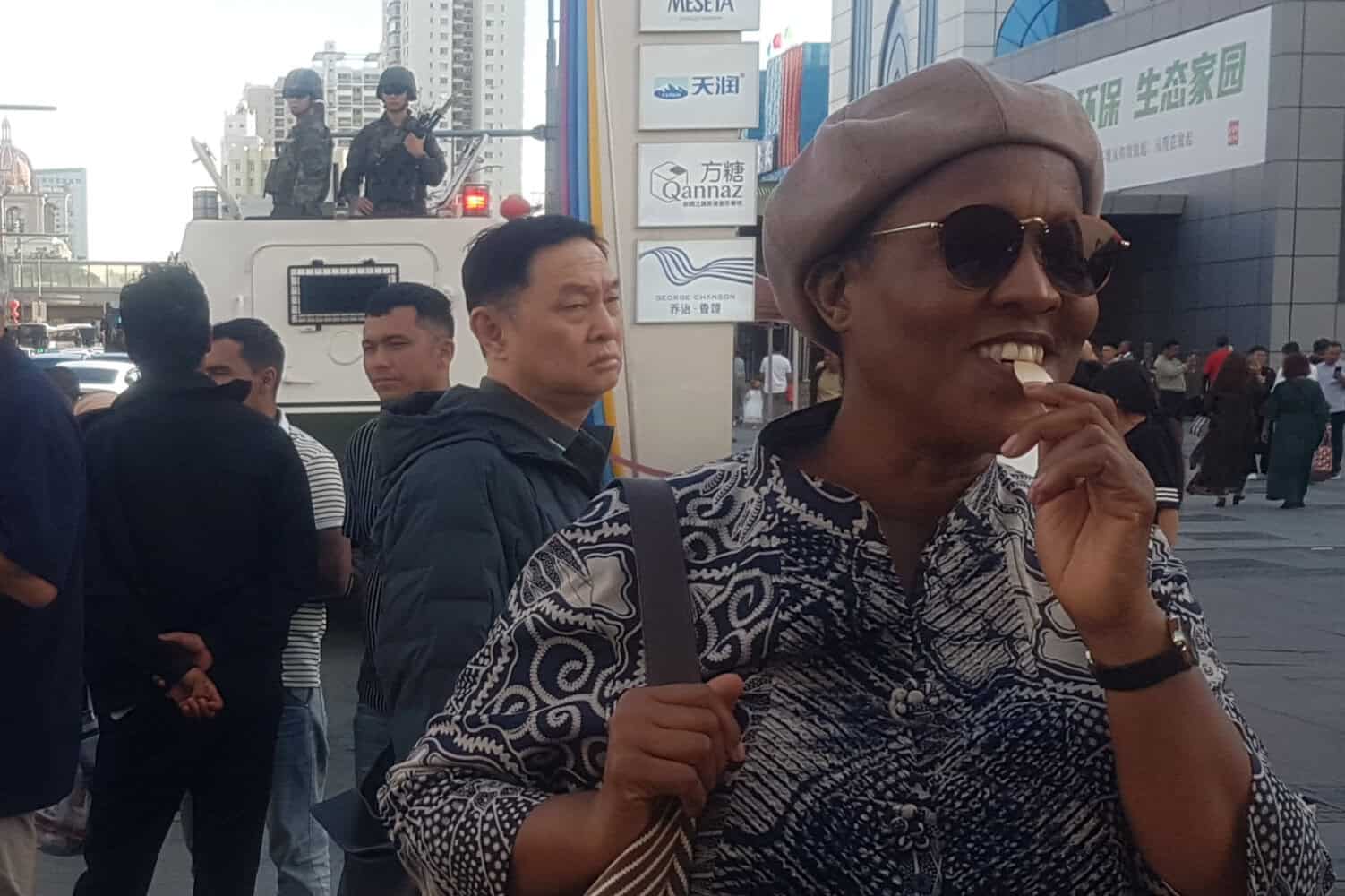 Dr Edith Phaswana at the Xinjiang International Grand Bazaar with permanently stationed guards in the background. Picture: Jarryd Westerdale.