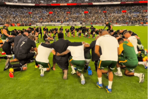 Springboks All Blacks pray together