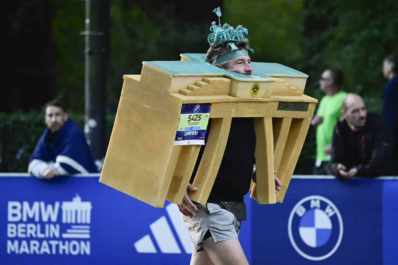 German runner Thorsten in a Brandenburg Gate costume takes the start of the 52nd edition of the Berlin Marathon in Berlin, Germany on September 27, 2026. (Photo by John MACDOUGALL / AFP)