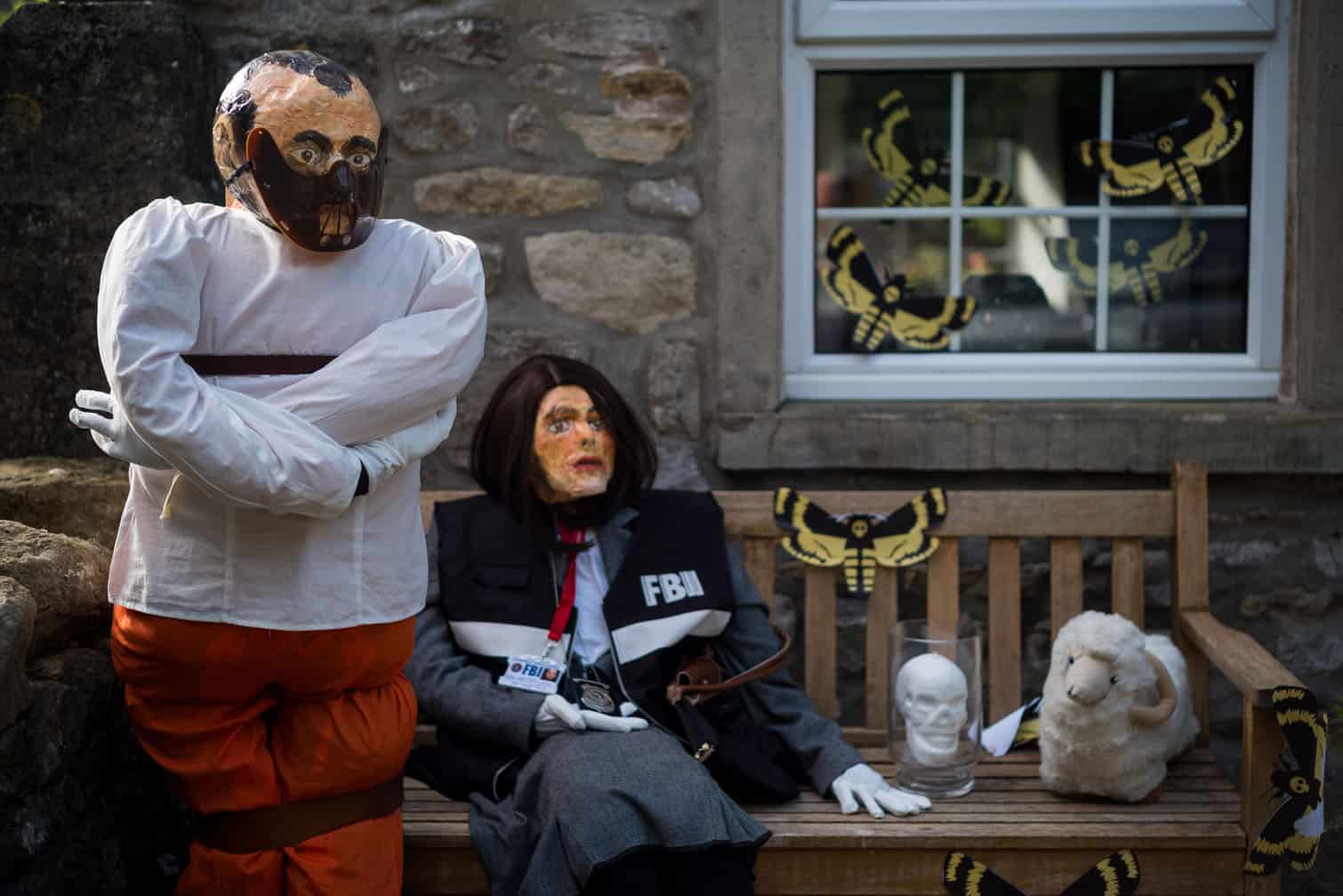 Home made scarecrows are displayed during the Kettlewell scarecrow festival on August 08, 2026 in Kettlewell, England.  The two week Festival is a community-based festival that celebrates the creativity of the Yorkshire Dales village as it is brought to life with displays of both traditional and more modern scarecrows, including parodies of current affairs and celebrities. The first Scarecrow Festival was held in 1994 as a fundraising event for Kettlewell Primary School.  (Photo by Ian Forsyth/Getty Images)