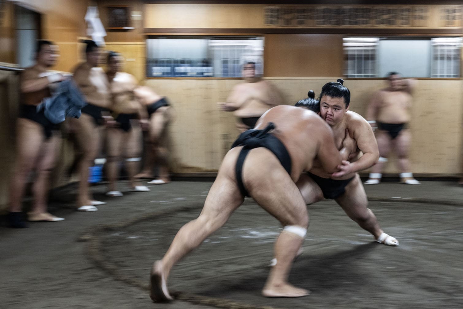 Sumo wrestlers train during a morning practice session at Musashigawa sumo stable in Tokyo on September 8, 2026. (Photo by Andrew CABALLERO-REYNOLDS / AFP)