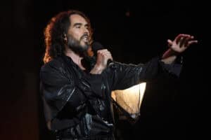 Russell Brand speaks onstage during MusiCares Person of the Year honoring Aerosmith at West Hall at Los Angeles Convention Center on January 24, 2020 in Los Angeles, California. (Photo by Kevin Mazur/Getty Images for The Recording Academy)