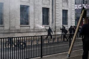 Teenager loses hand picking up grenade in France school protests