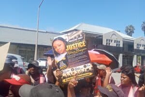 Community gathers outside court in Free State.