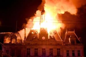 Building on fire, Paris protest, SA lessons.