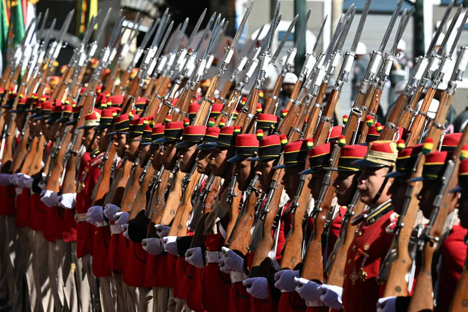 Members of an honour guard stand during a welcome ceremony for Bolivia's President Rodrigo Paz and Chile's President Jose Antonio Kast at Plaza Murillo in La Paz on October 16, 2026. (Photo by AIZAR RALDES / AFP)