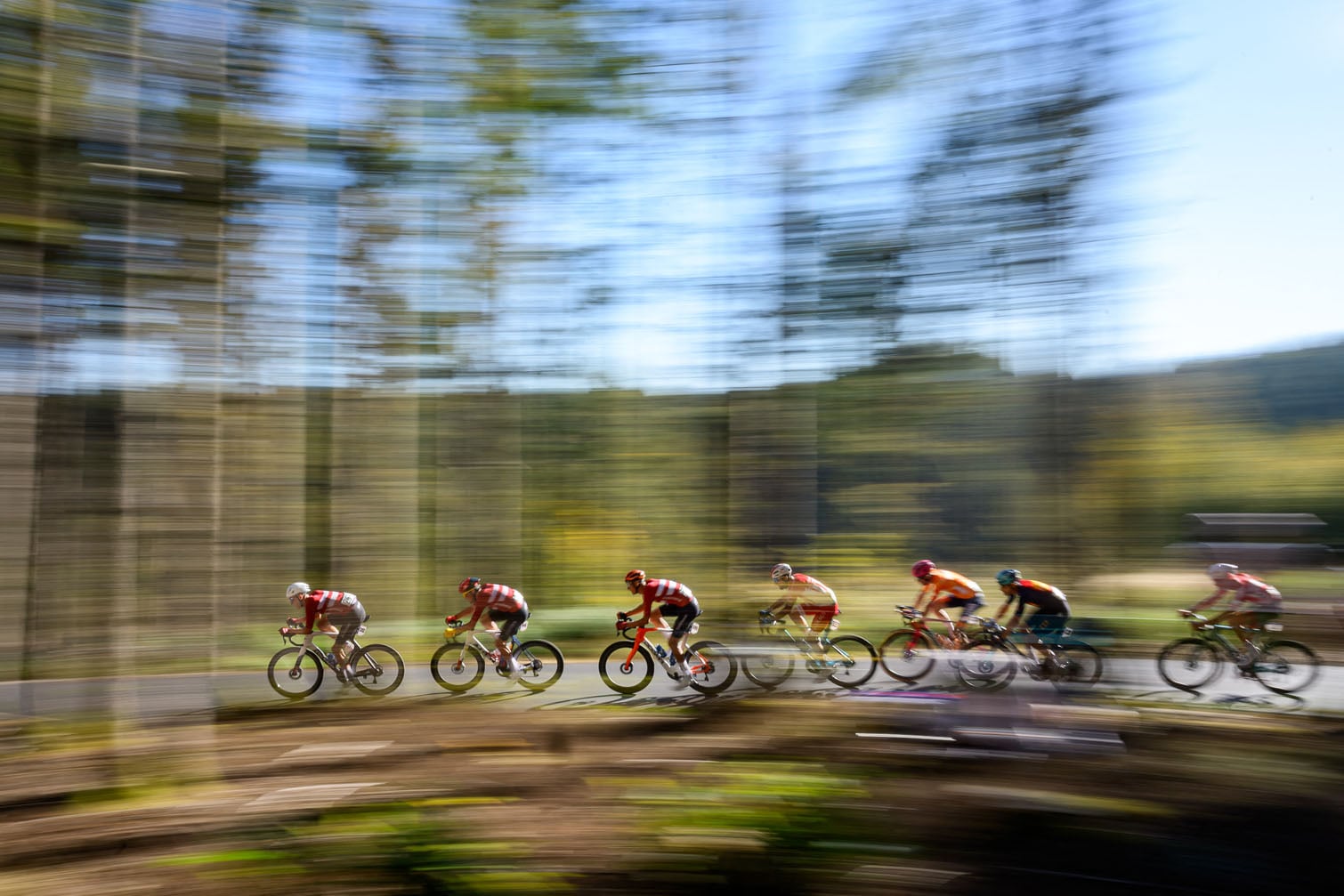 (LtoR) Denmark's Mikkel Norsgaard Bjerg, Mads Pedersen and Peter Hansen, followed by Monaco's Victor Langellotti, the Netherlands' Jardi van der Lee, Spain's Pau Miquel Delgado and Austria's Michael Gogl compete in the men's elite road race of the UEC European Road Cycling Championships between Ljubljana and Sencur, on October 4, 2026. (Photo by Jure Makovec / AFP)