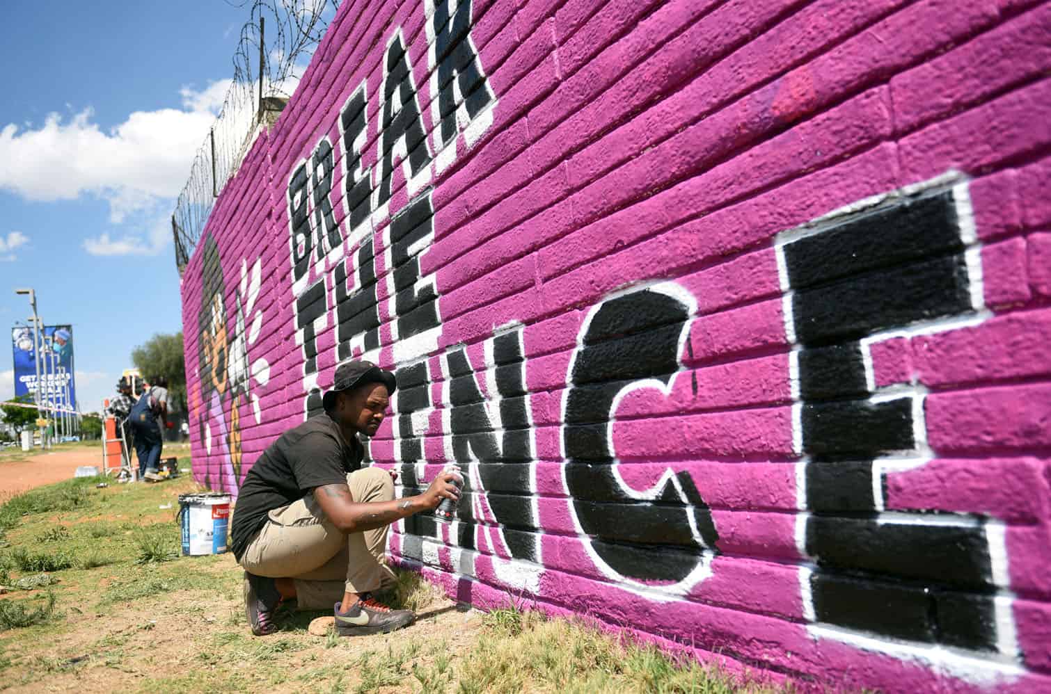 Graffiti artist Sihle Mbongwa, known as Fly One, takes part in painting a gender-based violence (GBV) awareness mural on the exterior walls of Chris Hani Baragwanath Academic Hospital in Soweto, 3 October 2026. The community-led initiative aims to raise awareness of gender-based violence and femicide (GBVF) and brings together 30 local mural artists, community members and political leaders, including ANC Greater Johannesburg Regional Chairperson Loyiso Masuku. Picture: Nigel Sibanda/The Citizen