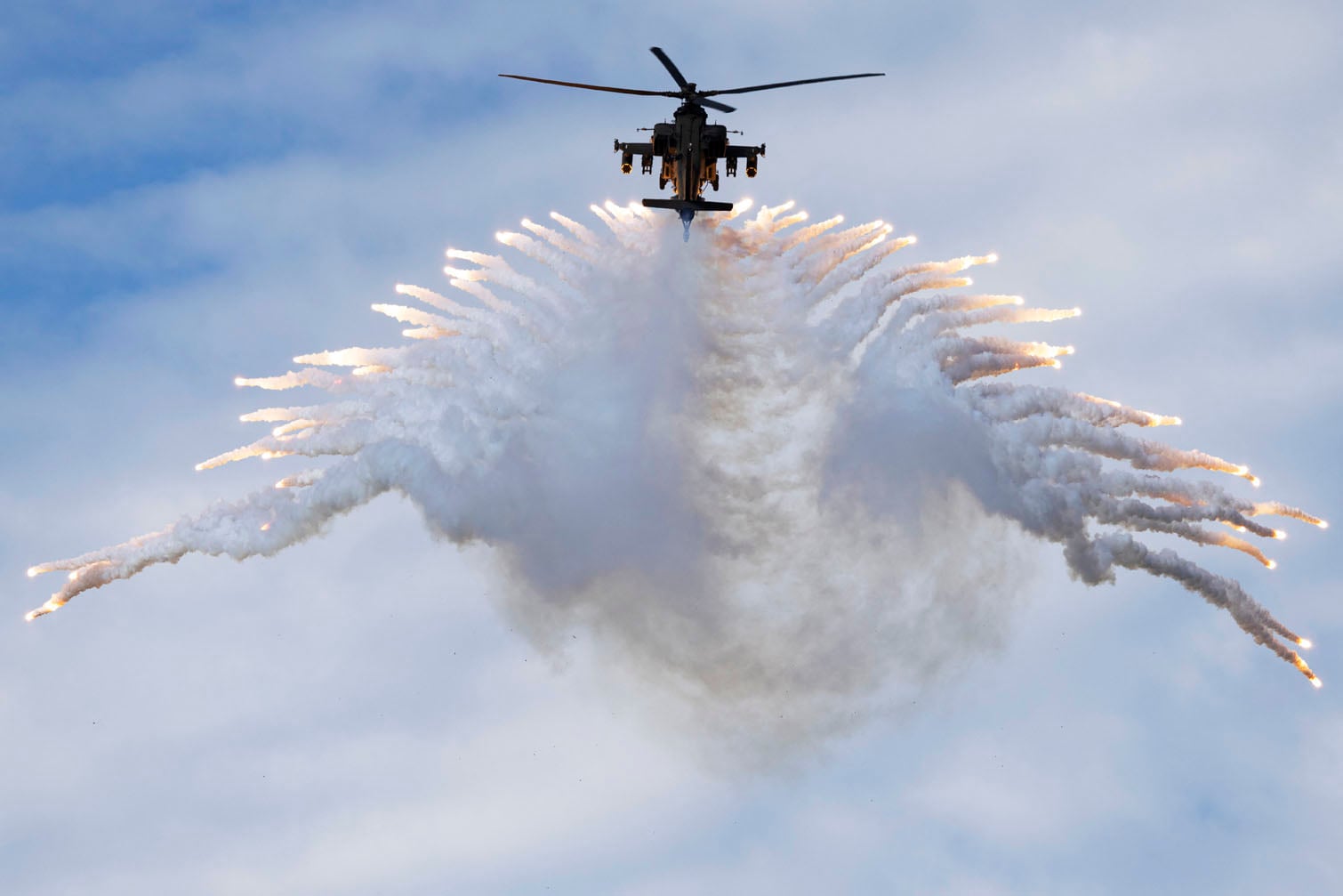A South Korean Apache AH-64E helicopter takes part in the 78th Armed Forces Day at a military base in Gyeryong on October 1, 2026. (Photo by JEON HEON-KYUN / POOL / AFP)
