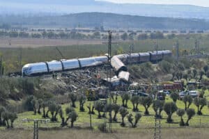 Emergency services are seen at the site of a train collision