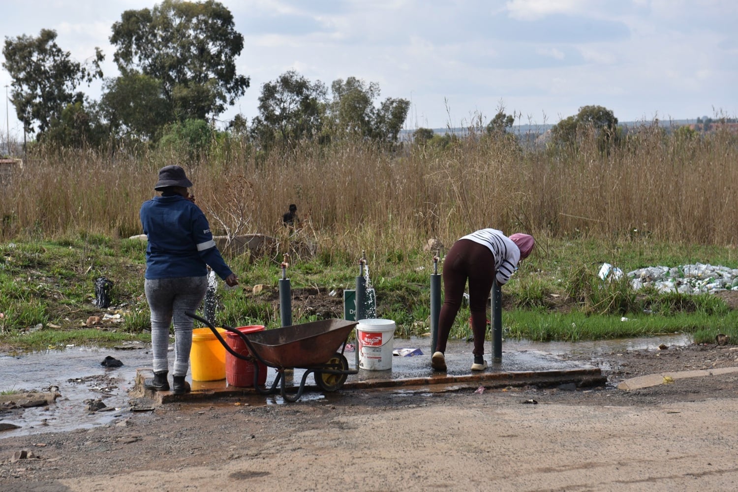 Women collect drinking water at the Hlalanikahle bulk water augmentation plant in the Emalahleni Local Municipality on 8 September 2026. The project aims to strengthen water supply to communities in the area. Picture: Shaun Holland/The Citizen